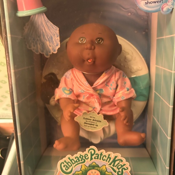 Cabbage Patch Kids Other - Pink Bath Doll with Cherubic Features and Dark Brown Skin